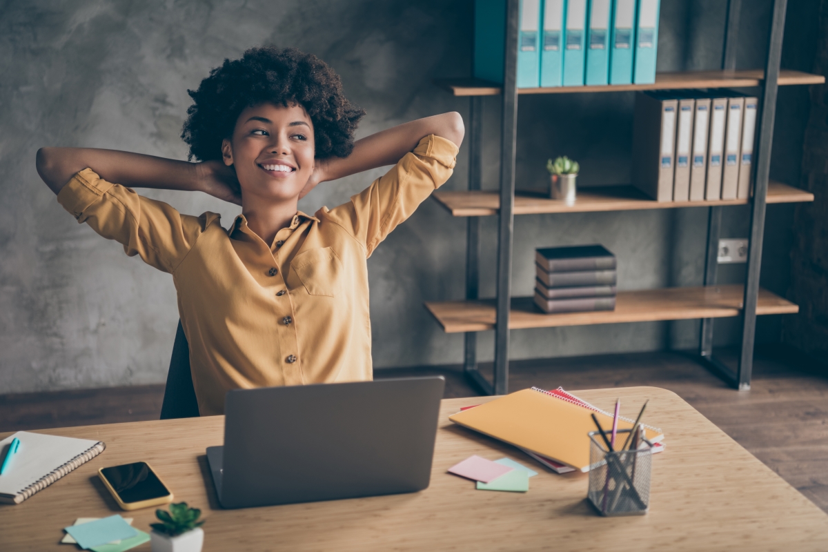 women celebrating affiliate commission at desk